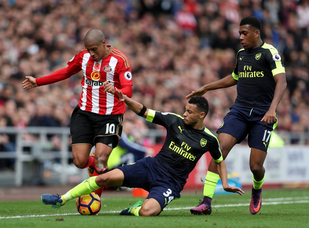 SUNDERLAND, ENGLAND - OCTOBER 29: Wahbi Khazri of Sunderland (L) is tackled by Francis Coquelin of Arsenal (C) during the Premier League match between Sunderland and Arsenal at the Stadium of Light on October 29, 2016 in Sunderland, England. (Photo by Ian MacNicol/Getty Images)