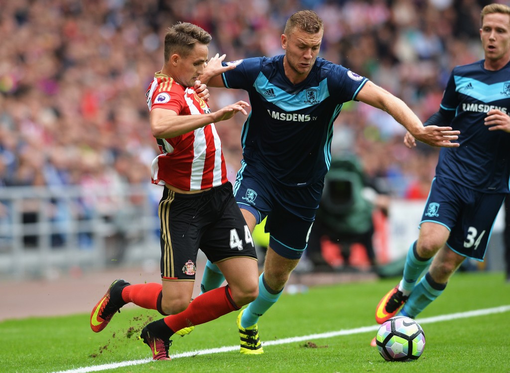 SUNDERLAND, ENGLAND - AUGUST 21: Adnan Januzaj of Sunderland takes on Ben Gibson of Middlesbrough during the Premier League match between Sunderland and Middlesbrough at Stadium of Light on August 21, 2016 in Sunderland, England. (Photo by Mark Runnacles/Getty Images)