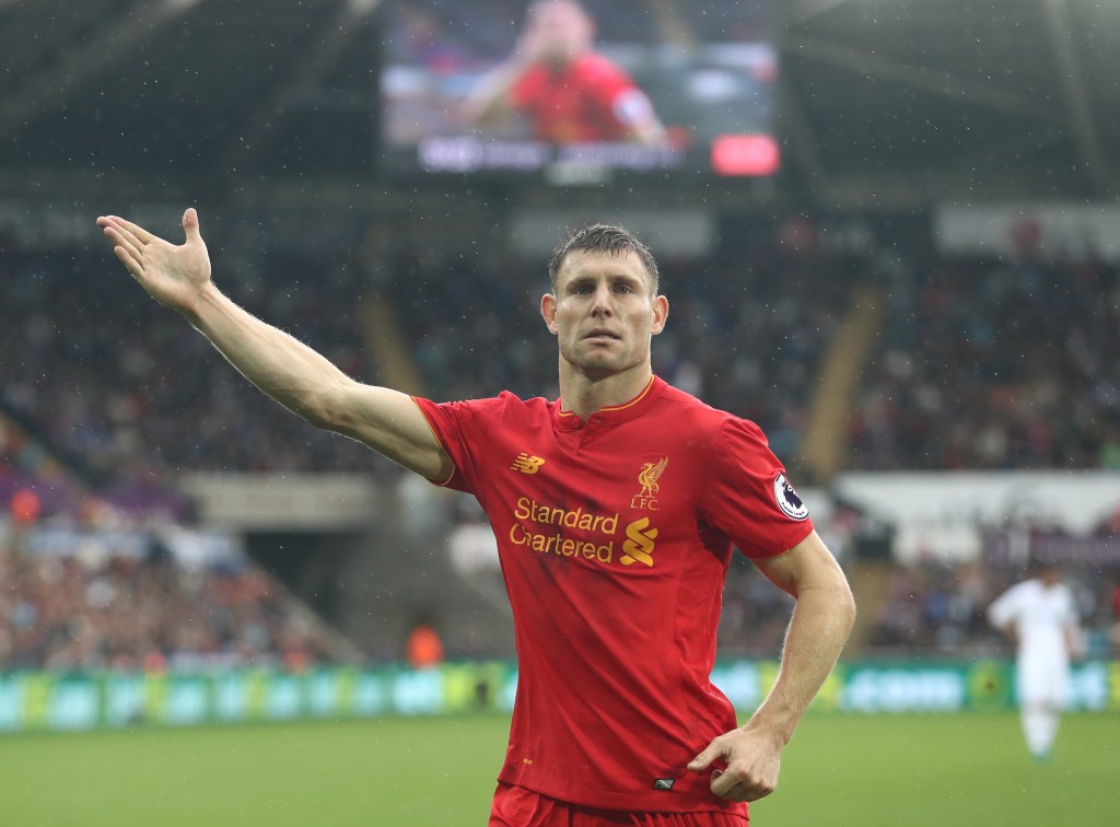 SWANSEA, WALES - OCTOBER 01: James Milner of Liverpool celebrates scoring his sides second goal during the Premier League match between Swansea City and Liverpool at Liberty Stadium on October 1, 2016 in Swansea, Wales. (Photo by Julian Finney/Getty Images)