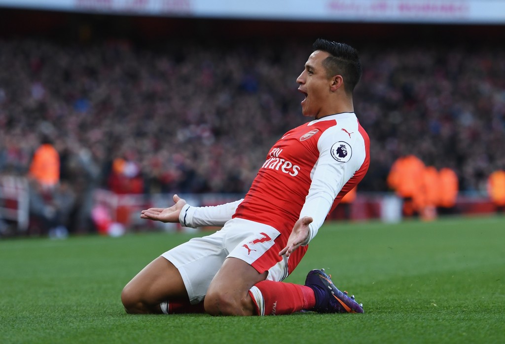 LONDON, ENGLAND - NOVEMBER 27: Alexis Sanchez of Arsenal celebrates scoring his sides first goal during the Premier League match between Arsenal and AFC Bournemouth at Emirates Stadium on November 27, 2016 in London, England. (Photo by Shaun Botterill/Getty Images)