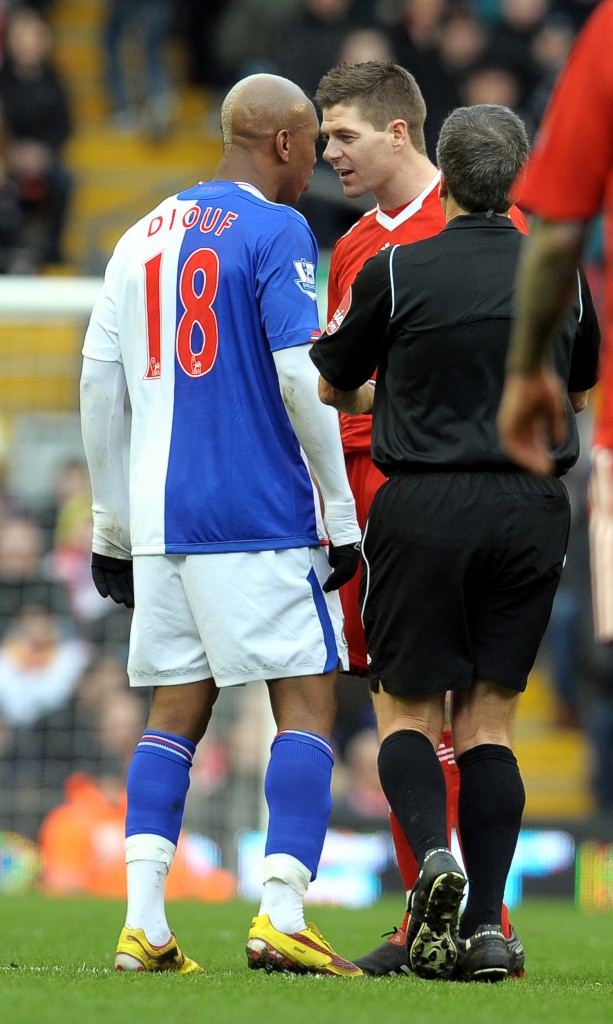 Blackburn Rovers' Senegal midfielder El Hadji Diouf (L) exchanges words with Liverpool's English midfielder Steven Gerrard during the English Premier League football match football match at Anfield, Liverpool, north-west, England, on February 28, 2010. AFP PHOTO/ ANDREW YATES. --- RESTRICTED TO EDITORIAL USE Additional licence required for any commercial/promotional use or use on TV or internet (except identical online version of newspaper) of Premier League/Football League photos. Tel DataCo +44 207 2981656. Do not alter/modify photo (Photo credit should read ANDREW YATES/AFP/Getty Images)