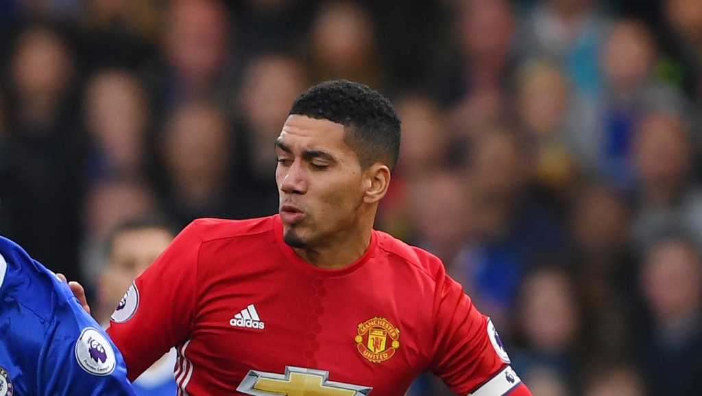 LONDON, ENGLAND - OCTOBER 23: Chris Smalling of Manchester United tackles Diego Costa of Chelsea during the Premier League match between Chelsea and Manchester United at Stamford Bridge on October 23, 2016 in London, England. (Photo by Mike Hewitt/Getty Images)