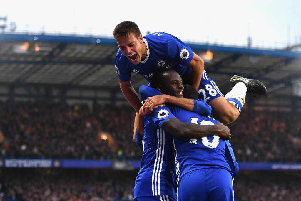 LONDON, ENGLAND - OCTOBER 23: Eden Hazard of Chelsea celebrates scoring his sides third goal with his team mates Cesar Azpilicueta and Victor Moses during the Premier League match between Chelsea and Manchester United at Stamford Bridge on October 23, 2016 in London, England. (Photo by Mike Hewitt/Getty Images)