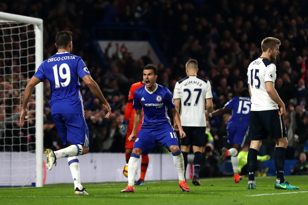 LONDON, ENGLAND - NOVEMBER 26: Pedro (C) of Chelsea celebrates scoring his team's first goal with his team mate Diego Costa (L) during the Premier League match between Chelsea and Tottenham Hotspur at Stamford Bridge on November 26, 2016 in London, England. (Photo by Clive Rose/Getty Images)