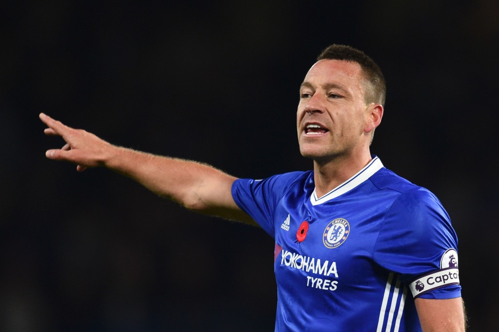Chelsea's English defender John Terry gestures during the English Premier League football match between Chelsea and Everton at Stamford Bridge in London on November 5, 2016. Chelsea won the game 5-0. / AFP / Glyn KIRK / RESTRICTED TO EDITORIAL USE. No use with unauthorized audio, video, data, fixture lists, club/league logos or 'live' services. Online in-match use limited to 75 images, no video emulation. No use in betting, games or single club/league/player publications. / (Photo credit should read GLYN KIRK/AFP/Getty Images)