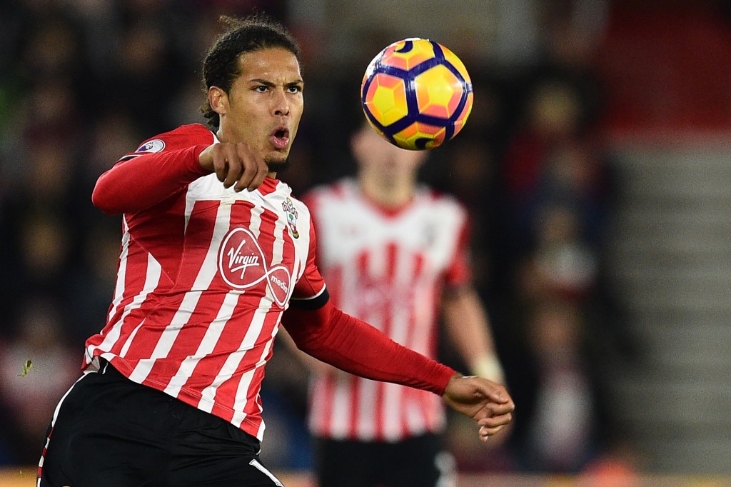 Southampton's Dutch defender Virgil van Dijk controls the ball during the English Premier League football match between Southampton and Everton at St Mary's Stadium in Southampton, southern England on November 27, 2016. / AFP / Glyn KIRK / RESTRICTED TO EDITORIAL USE. No use with unauthorized audio, video, data, fixture lists, club/league logos or 'live' services. Online in-match use limited to 75 images, no video emulation. No use in betting, games or single club/league/player publications. / (Photo credit should read GLYN KIRK/AFP/Getty Images)