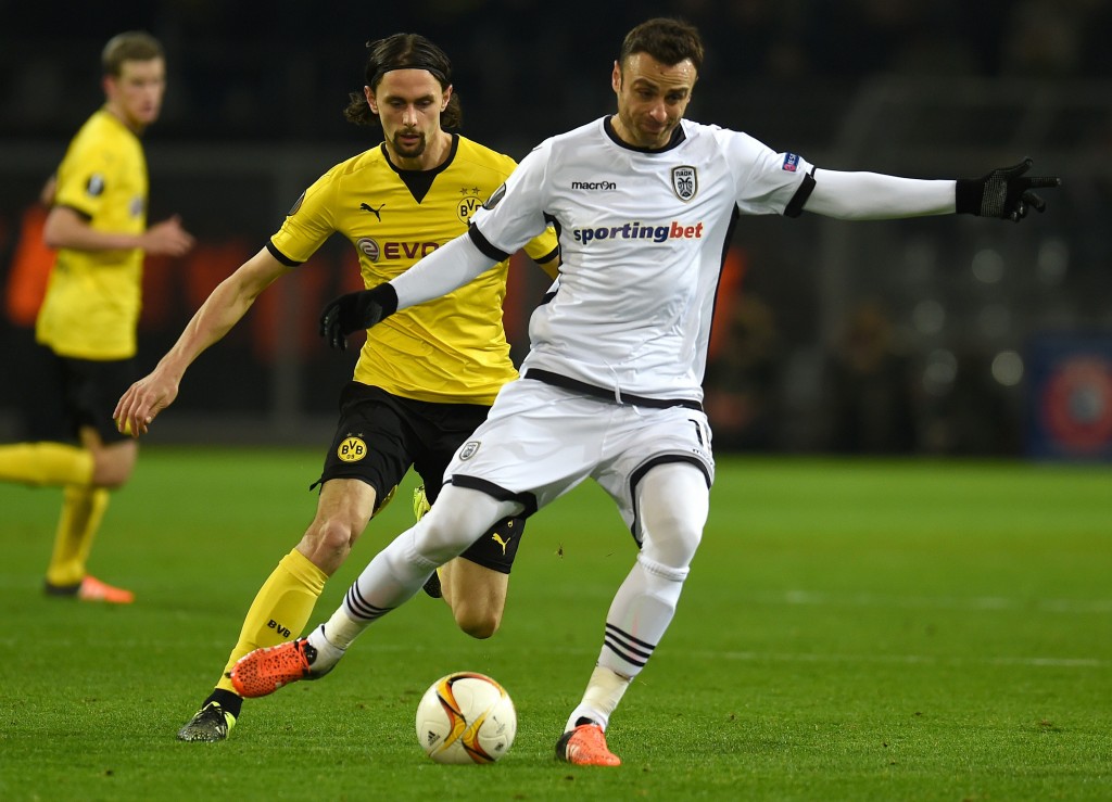 Dortmund's Serbian defender Neven Subotic (L) vies with PAOK´s Bulgarian striker Dimitar Berbatov during the UEFA Europa League football match between Borussia Dortmund and PAOK FC at BVB Stadion Dortmund in Dortmund on December 10, 2015. AFP PHOTO / PATRIK STOLLARZ / AFP / PATRIK STOLLARZ (Photo credit should read PATRIK STOLLARZ/AFP/Getty Images)