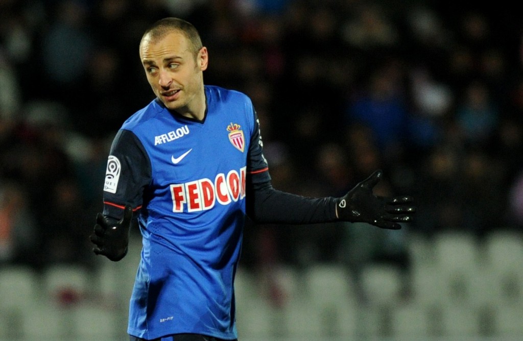 Monaco's Bulgarian forward Dimitar Berbatov celebrates after scoring a goal during the French L1 football match between Evian TG and Monaco at the Parc des Sports stadium in Annecy, southeastern France, on March 7, 2015. AFP PHOTO / JEAN-PIERRE CLATOT (Photo credit should read JEAN-PIERRE CLATOT/AFP/Getty Images)