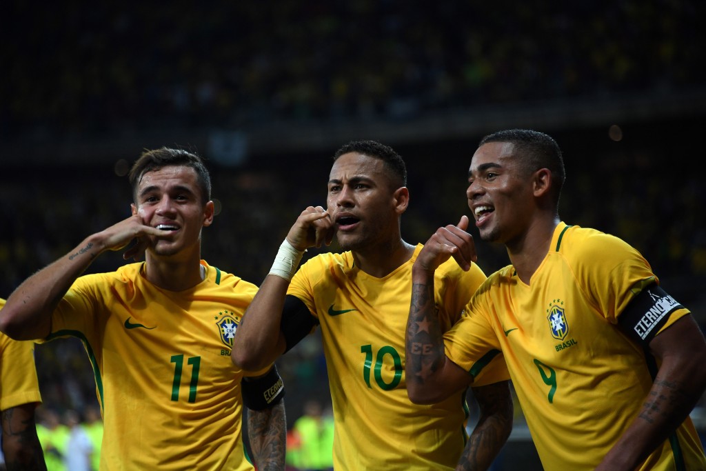 Brazil's Neymar (C) celebrates with teammates Philippe Coutinho (L) and Gabriel Jesus after scoring against Argentina during their 2018 FIFA World Cup qualifier football match in Belo Horizonte, Brazil, on November 10, 2016. / AFP / VANDERLEI ALMEIDA (Photo credit should read VANDERLEI ALMEIDA/AFP/Getty Images)