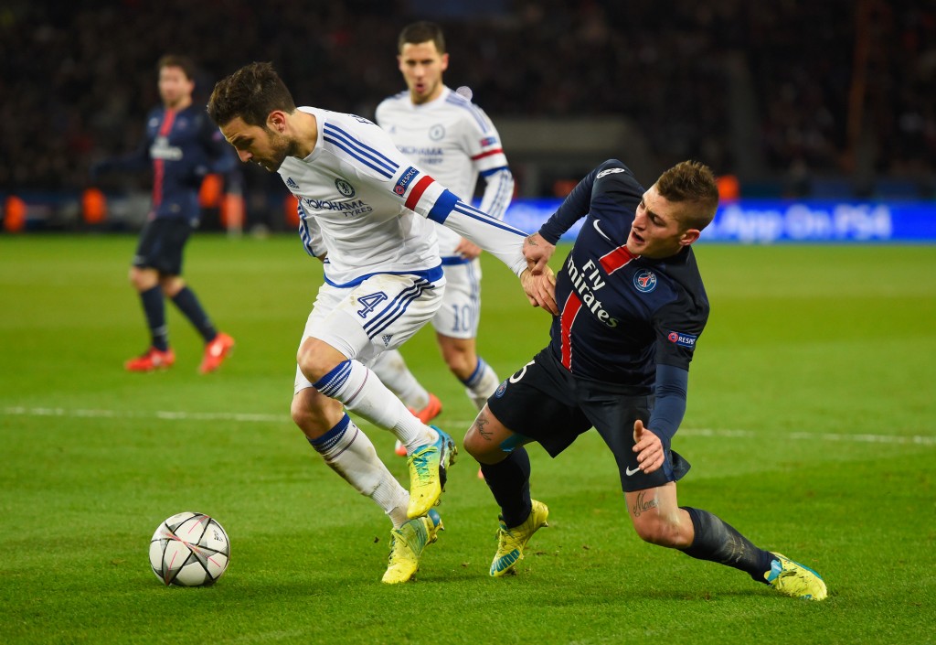 PARIS, FRANCE - FEBRUARY 16: Cesc Fabregas of Chelsea battles with Marco Verratti of Paris Saint-Germain during the UEFA Champions League round of 16 first leg match between Paris Saint-Germain and Chelsea at Parc des Princes on February 16, 2016 in Paris, France. (Photo by Mike Hewitt/Getty Images)