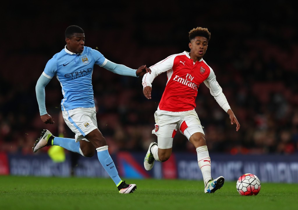 LONDON, ENGLAND - APRIL 04: Reiss Nelson of Arsenal battles with Javairo Dilrosun of Man City during the FA Youth Cup semi-final second leg match between Arsenal and Manchester City at Emirates Stadium on April 4, 2016 in London, England. (Photo by Julian Finney/Getty Images)