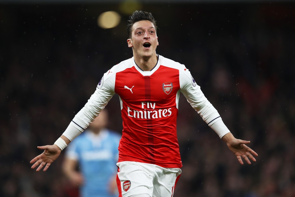 LONDON, ENGLAND - DECEMBER 10: Mesut Ozil of Arsenal celebrates scoring his sides second goal during the Premier League match between Arsenal and Stoke City at the Emirates Stadium on December 10, 2016 in London, England. (Photo by Julian Finney/Getty Images)