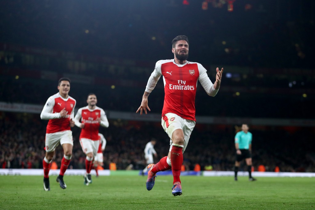 LONDON, ENGLAND - DECEMBER 26: Olivier Giroud of Arsenal celebrates after scoring the opening goal during the Premier League match between Arsenal and West Bromwich Albion at Emirates Stadium on December 26, 2016 in London, England. (Photo by Julian Finney/Getty Images)