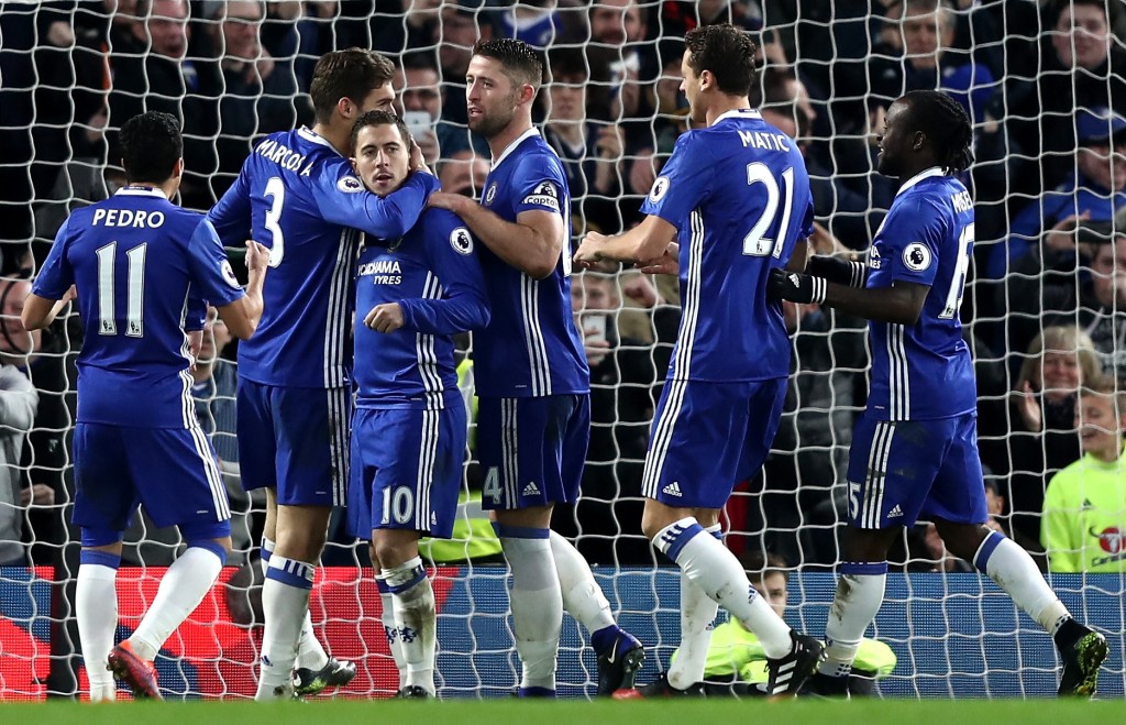 LONDON, ENGLAND - DECEMBER 26: Eden Hazard of Chelsea celebrates with team mates after scoring his sides second goal during the Premier League match between Chelsea and AFC Bournemouth at Stamford Bridge on December 26, 2016 in London, England. (Photo by Clive Rose/Getty Images)