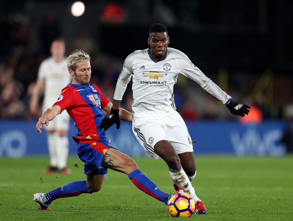 LONDON, ENGLAND - DECEMBER 14: Paul Pogba of Manchester United and Yohan Cabaye of Crystal Palace compete for the ball during the Premier League match between Crystal Palace and Manchester United at Selhurst Park on December 14, 2016 in London, England. (Photo by Christopher Lee/Getty Images)