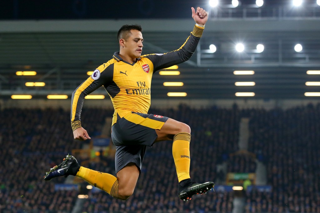 LIVERPOOL, ENGLAND - DECEMBER 13: Alexis Sanchez of Arsenal celebrates after scoring the opening goal during the Premier League match between Everton and Arsenal at Goodison Park on December 13, 2016 in Liverpool, England. (Photo by Alex Livesey/Getty Images)