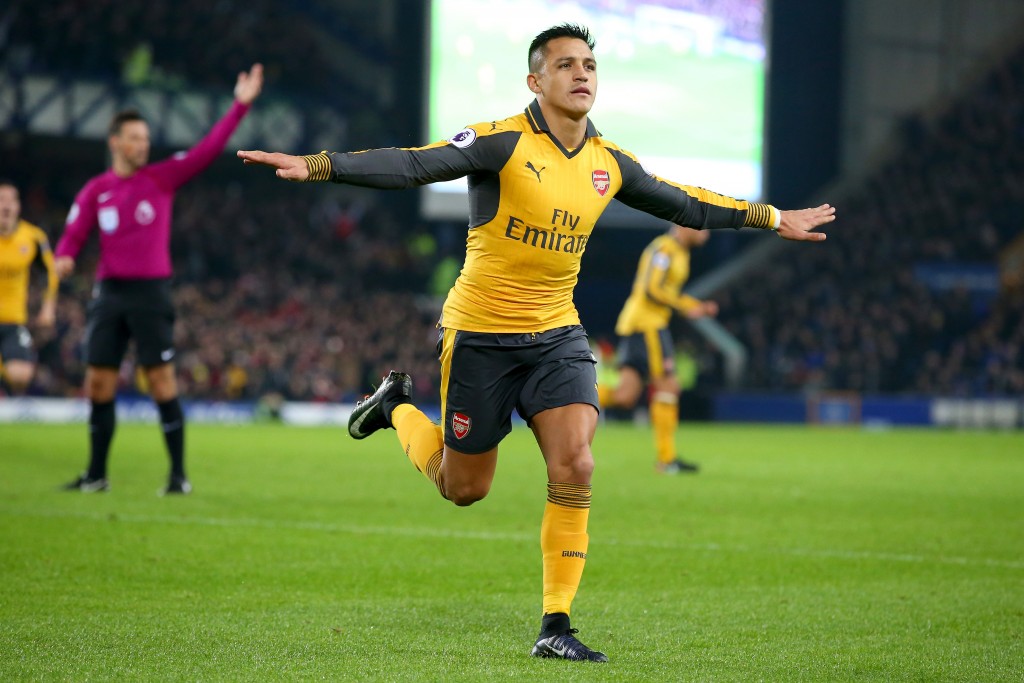 LIVERPOOL, ENGLAND - DECEMBER 13: Alexis Sanchez of Arsenal celebrates after scoring the opening goal during the Premier League match between Everton and Arsenal at Goodison Park on December 13, 2016 in Liverpool, England. (Photo by Alex Livesey/Getty Images)