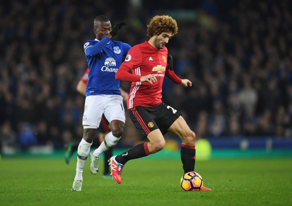 LIVERPOOL, ENGLAND - DECEMBER 04: Marouane Fellaini of Manchester United holds off Enner Valencia of Everton during the Premier League match between Everton and Manchester United at Goodison Park on December 4, 2016 in Liverpool, England. (Photo by Laurence Griffiths/Getty Images)