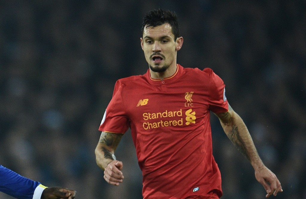Everton's Belgian striker Romelu Lukaku (C) vies with Liverpool's Estonian defender Ragnar Klavan (L) and Liverpool's Croatian defender Dejan Lovren during the English Premier League football match between Everton and Liverpool at Goodison Park in Liverpool, north west England on December 19, 2016. / AFP / Oli SCARFF / RESTRICTED TO EDITORIAL USE. No use with unauthorized audio, video, data, fixture lists, club/league logos or 'live' services. Online in-match use limited to 75 images, no video emulation. No use in betting, games or single club/league/player publications. / (Photo credit should read OLI SCARFF/AFP/Getty Images)