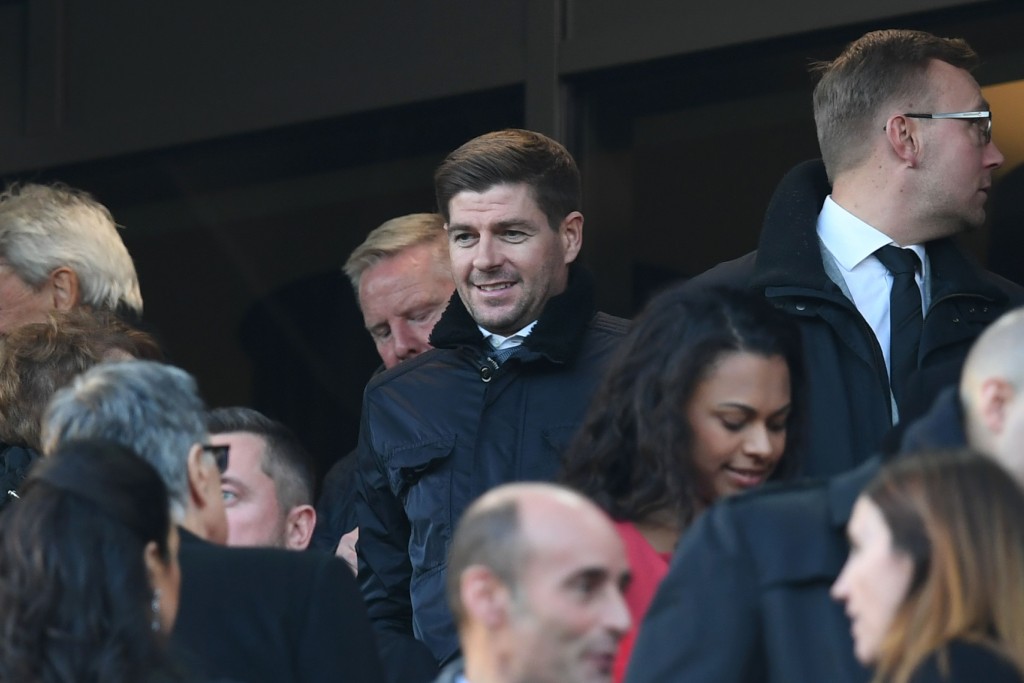 Former Liverpool legend Steven Gerrard (C) watches during the English Premier League football match between Liverpool and Sunderland at Anfield in Liverpool, north west England on November 26, 2016. / AFP / Paul ELLIS / RESTRICTED TO EDITORIAL USE. No use with unauthorized audio, video, data, fixture lists, club/league logos or 'live' services. Online in-match use limited to 75 images, no video emulation. No use in betting, games or single club/league/player publications. / (Photo credit should read PAUL ELLIS/AFP/Getty Images)