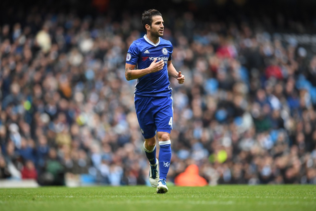 Chelsea's Spanish midfielder Cesc Fabregas runs during the English Premier League football match between Manchester City and Chelsea at the Etihad Stadium in Manchester, north west England, on December 3, 2016. / AFP / Paul ELLIS / RESTRICTED TO EDITORIAL USE. No use with unauthorized audio, video, data, fixture lists, club/league logos or 'live' services. Online in-match use limited to 75 images, no video emulation. No use in betting, games or single club/league/player publications. / (Photo credit should read PAUL ELLIS/AFP/Getty Images)