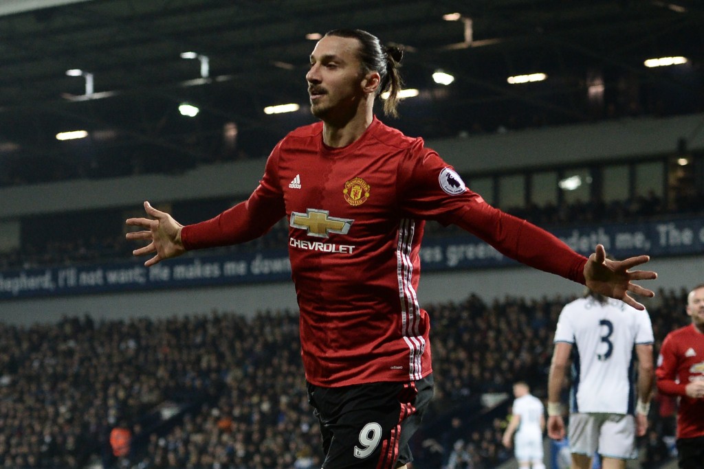 Manchester United's Swedish striker Zlatan Ibrahimovic celebrates after scoring the opening goal of the English Premier League football match between West Bromwich Albion and Manchester United at The Hawthorns stadium in West Bromwich, central England, on December 17, 2016. (Photo by Oli Scarff/AFP/Getty Images)