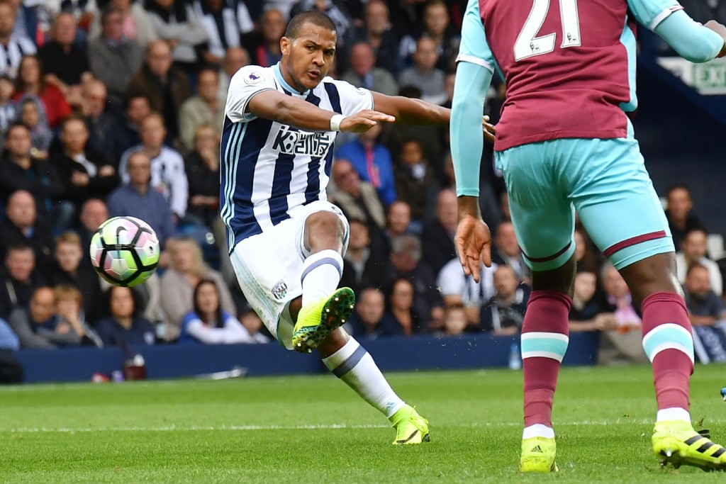 West Bromwich Albion's Venezuelan striker Salomon Rondon strikes the ball during the English Premier League football match between West Bromwich Albion and West Ham United at The Hawthorns stadium in West Bromwich, central England, on September 17, 2016. / AFP / BEN STANSALL / RESTRICTED TO EDITORIAL USE. No use with unauthorized audio, video, data, fixture lists, club/league logos or 'live' services. Online in-match use limited to 75 images, no video emulation. No use in betting, games or single club/league/player publications. / (Photo credit should read BEN STANSALL/AFP/Getty Images)