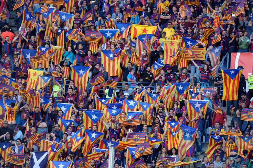 FC Barcelona supporters hold "esteladas" pro-independence Catalan flags before the Spanish "Copa del Rey" (King's Cup) final match FC Barcelona vs Sevilla FC at the Vicente Calderon stadium in Madrid on May 22, 2016. (Photo by Josep Lago/AFP/Getty Images)
