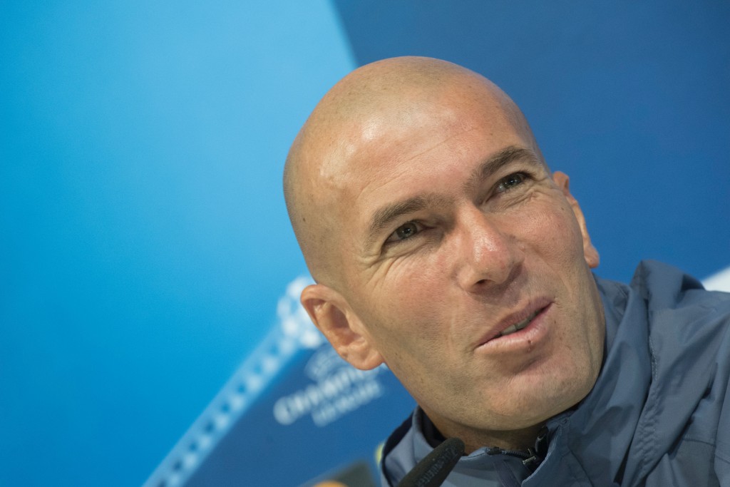 Real Madrid's French coach Zinedine Zidane gives a press conference on the eve of the UEFA Champions league football match Real Madrid vs Borussia Dortmund at the Real Madrid's training ground of Valdebebas in Madrid on December 6, 2016. / AFP / CURTO DE LA TORRE (Photo credit should read CURTO DE LA TORRE/AFP/Getty Images)
