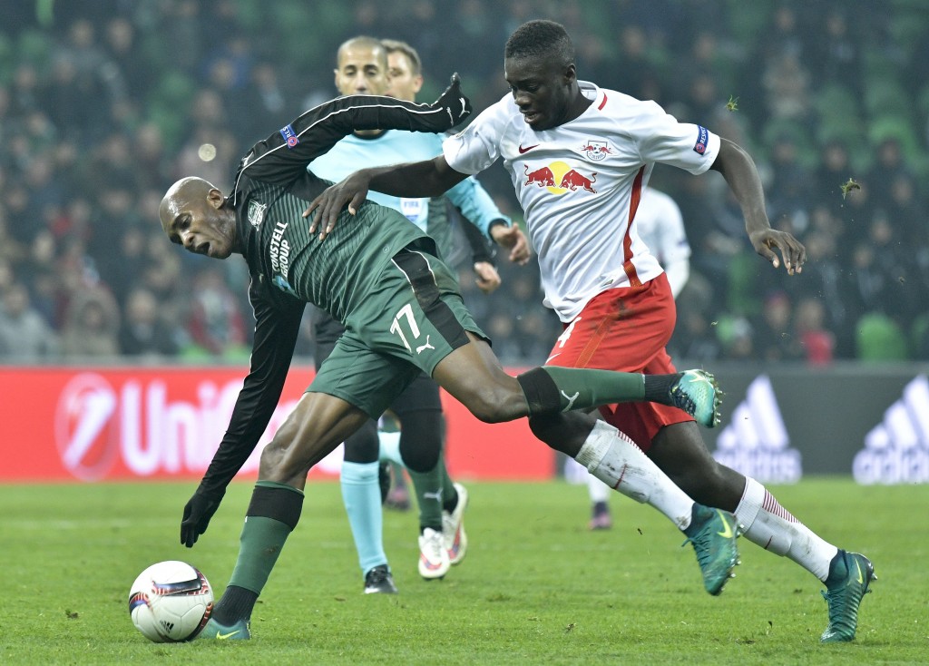 Charles Kabore (L) of FC Krasnodar and Dayot Upamecano (R) of FC Salzburg vie for the ball during the UEFA Europa League group I football match between FC Krasnodar and FC Salzburg in Krasnodar, Russia on November 24, 2016. / AFP / APA / HERBERT NEUBAUER / Austria OUT (Photo credit should read HERBERT NEUBAUER/AFP/Getty Images)