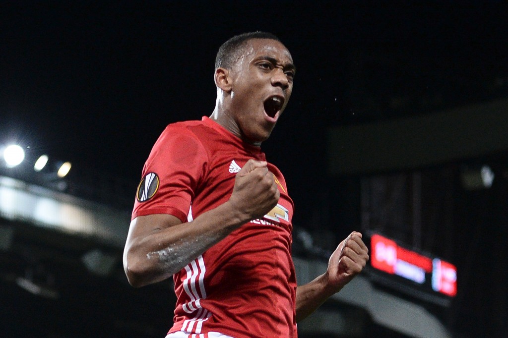 Manchester United's French striker Anthony Martial celebrates scoring their second goal from the penalty spot during the UEFA Europa League group A football match between Manchester United and Fenerbahce at Old Trafford in Manchester, north west England, on October 20, 2016. / AFP / OLI SCARFF (Photo credit should read OLI SCARFF/AFP/Getty Images)