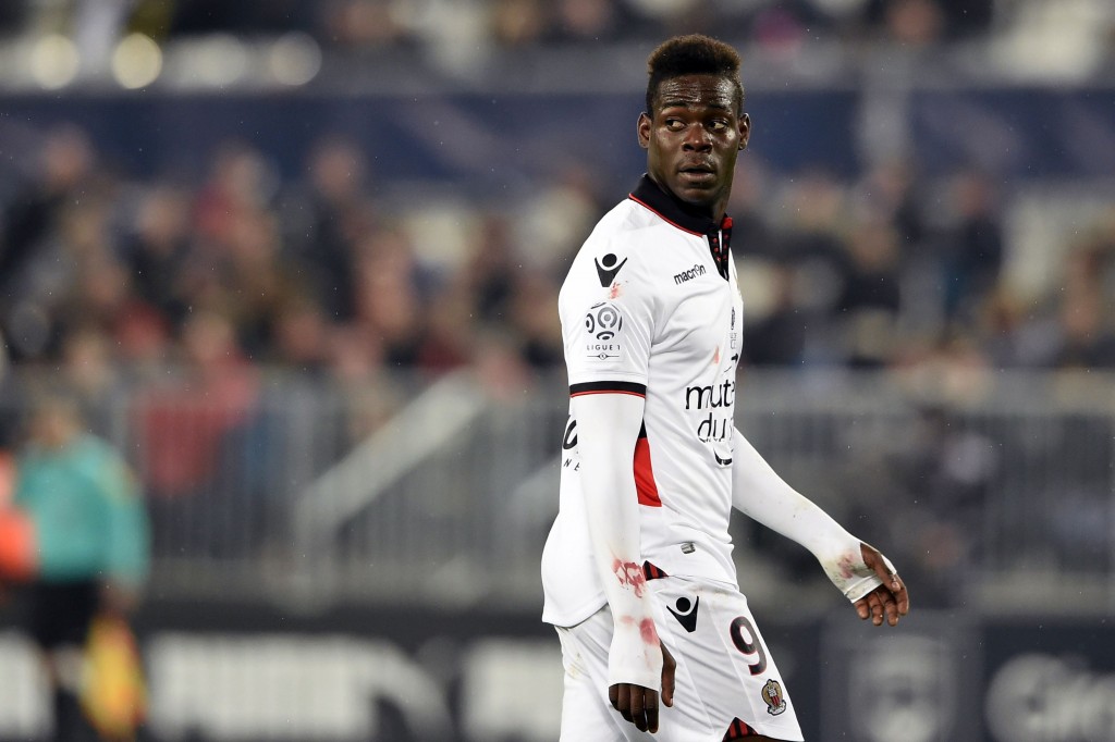 Nice's Italian forward Mario Balotelli looks on during the French Ligue 1 football match between Bordeaux and Nice on December 21, 2016 at the Matmut Atlantique stadium in Bordeaux, southwestern France. / AFP / NICOLAS TUCAT (Photo credit should read NICOLAS TUCAT/AFP/Getty Images)