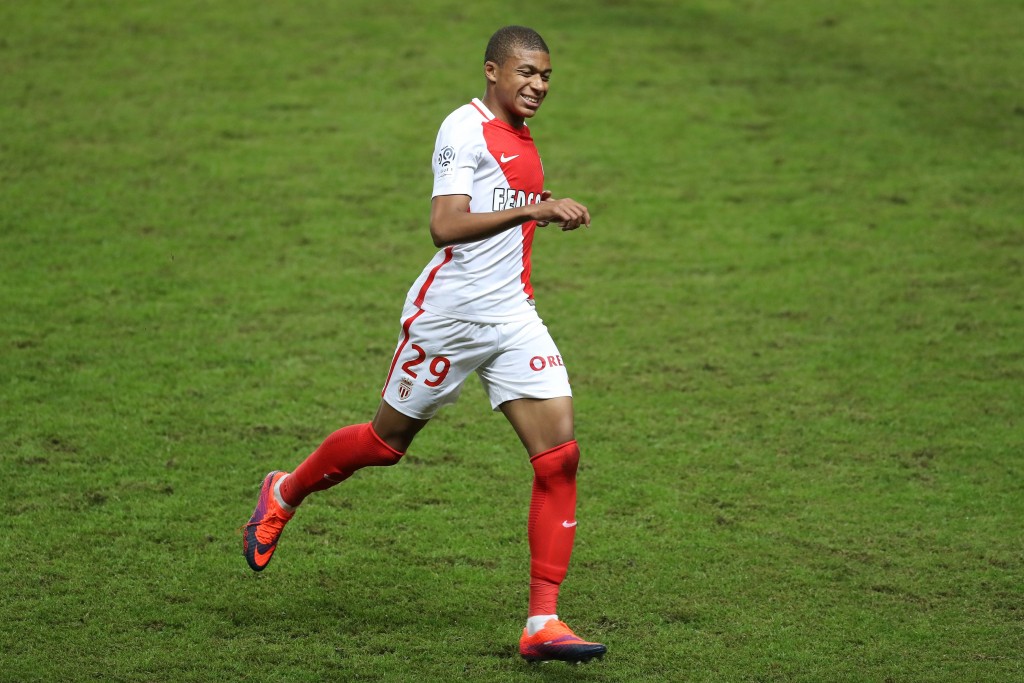 Monaco's French forward Kylian Mbappe Lottin runs during the French L1 football match Monaco (ASM) vs Nancy (ASNL) on November 5, 2016 at the "Louis II Stadium" in Monaco. / AFP / VALERY HACHE (Photo credit should read VALERY HACHE/AFP/Getty Images)