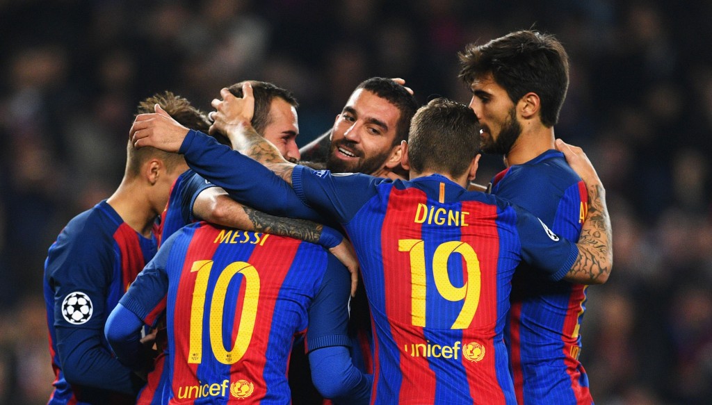 BARCELONA, SPAIN - DECEMBER 06: Arda Turan of Barcelona (C) celebrates with team mates as he scores their third goal during the UEFA Champions League Group C match between FC Barcelona and VfL Borussia Moenchengladbach at Camp Nou on December 6, 2016 in Barcelona, . (Photo by David Ramos/Getty Images)