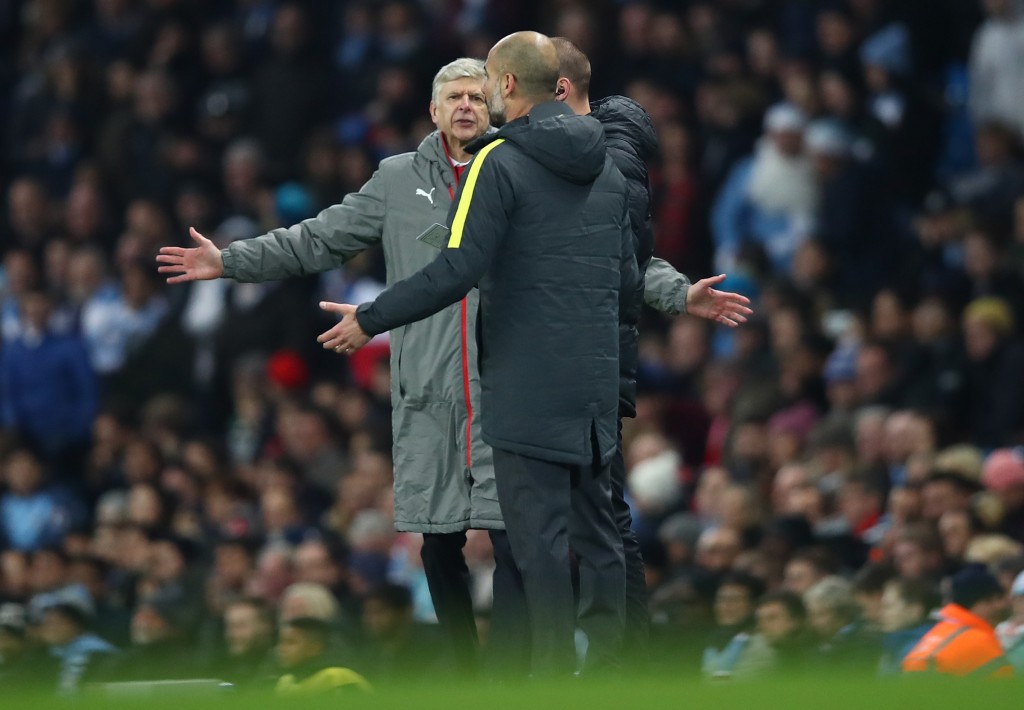MANCHESTER, ENGLAND - DECEMBER 18: Arsene Wenger, Manager of Arsenal (L) argues with Josep Guardiola, Manager of Manchester City (R) during the Premier League match between Manchester City and Arsenal at the Etihad Stadium on December 18, 2016 in Manchester, England. (Photo by Clive Brunskill/Getty Images)