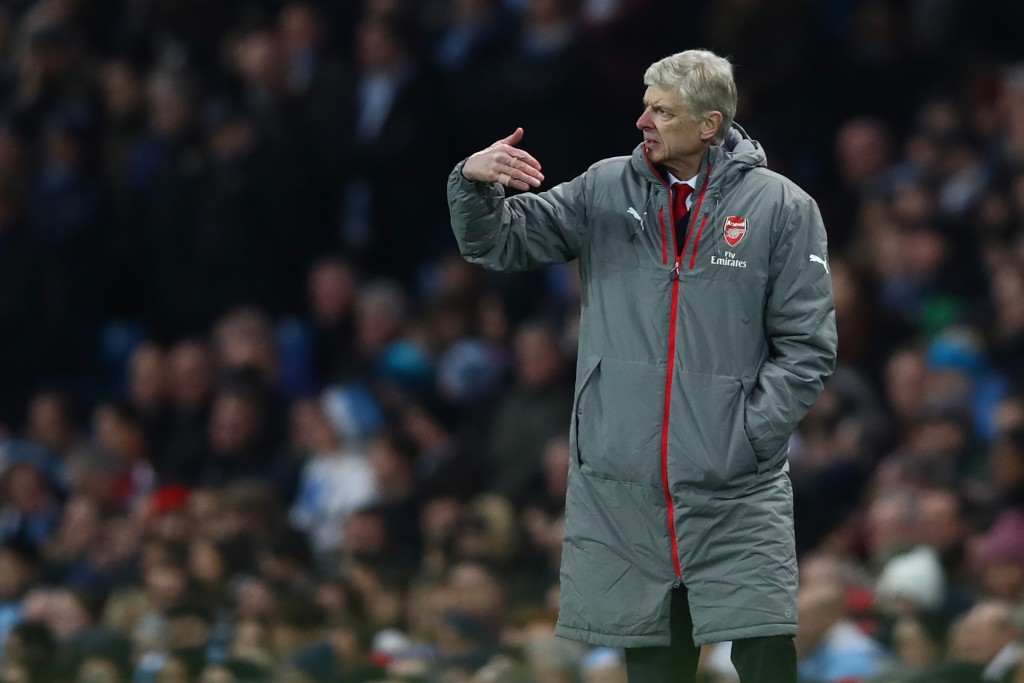 MANCHESTER, ENGLAND - DECEMBER 18: Arsene Wenger, Manager of Arsenal gives his team instructions during the Premier League match between Manchester City and Arsenal at the Etihad Stadium on December 18, 2016 in Manchester, England. (Photo by Clive Brunskill/Getty Images)