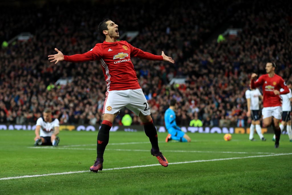 MANCHESTER, ENGLAND - DECEMBER 11: Henrikh Mkhitaryan of Manchester United celebrates scoring the opening goal during the Premier League match between Manchester United and Tottenham Hotspur at Old Trafford on December 11, 2016 in Manchester, England. (Photo by Richard Heathcote/Getty Images)