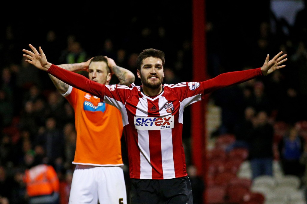 BRENTFORD, ENGLAND - FEBRUARY 24: Jon-Miquel Toral of Brentford celebrates after completing his hat-trick by scoring his team's fourth goal during the Sky Bet Championship match between Brentford and Blackpool at Griffin Park on February 24, 2015 in Brentford, England. (Photo by Paul Gilham/Getty Images)