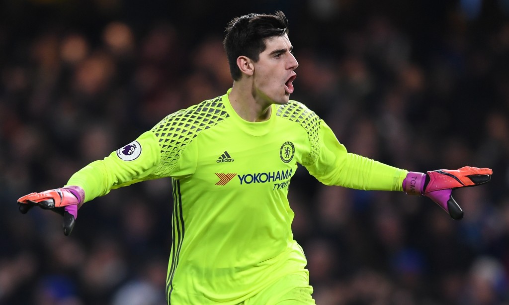 LONDON, ENGLAND - NOVEMBER 26: Thibaut Courtois of Chelsea celebrates his team's second goal during the Premier League match between Chelsea and Tottenham Hotspur at Stamford Bridge on November 26, 2016 in London, England. (Photo by Shaun Botterill/Getty Images)