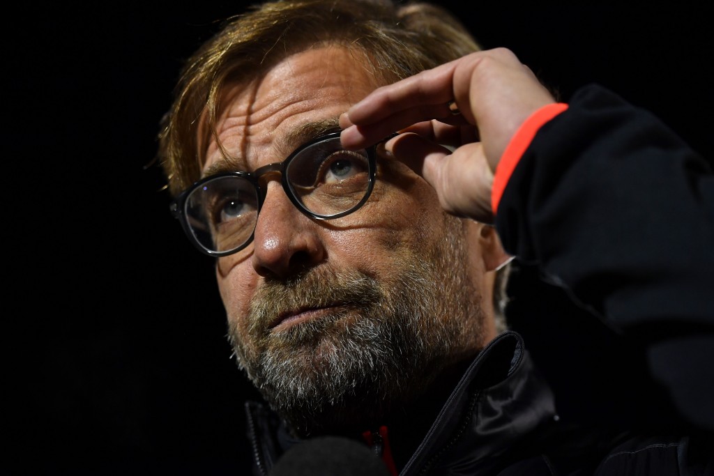 Liverpool's German manager Jurgen Klopp adjusts his glasses as he gives an interview ahead of the English FA Cup third round replay football match between Plymouth Argyle and Liverpool at Home Park in Plymouth, south west England on January 18, 2017. / AFP / Ben STANSALL / RESTRICTED TO EDITORIAL USE. No use with unauthorized audio, video, data, fixture lists, club/league logos or 'live' services. Online in-match use limited to 75 images, no video emulation. No use in betting, games or single club/league/player publications. / (Photo credit should read BEN STANSALL/AFP/Getty Images)