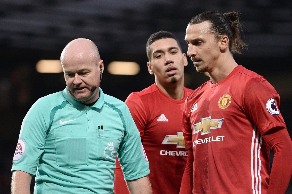 Manchester United's Swedish striker Zlatan Ibrahimovic (R) remonstrates with English referee Lee Mason, after Mason disallowed his goal, during the English Premier League football match between Manchester United and Middlesbrough at Old Trafford in Manchester, north west England, on December 31, 2016. (Photo by Oli Scarff/AFP/Getty Images)