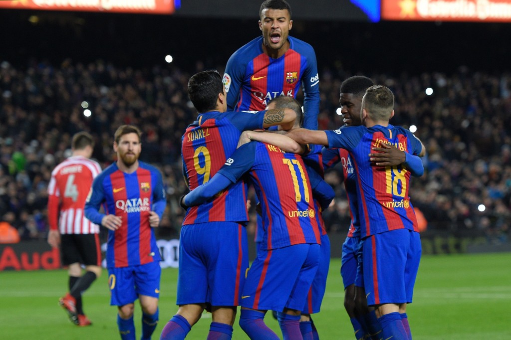 Barcelona's players celebrate after scoring a goal during the Spanish Copa del Rey (King's Cup) round of 16 second leg football match FC Barcelona vs Athletic Club de Bilbao at the Camp Nou stadium in Barcelona on January 11, 2017. / AFP / LLUIS GENE (Photo credit should read LLUIS GENE/AFP/Getty Images)