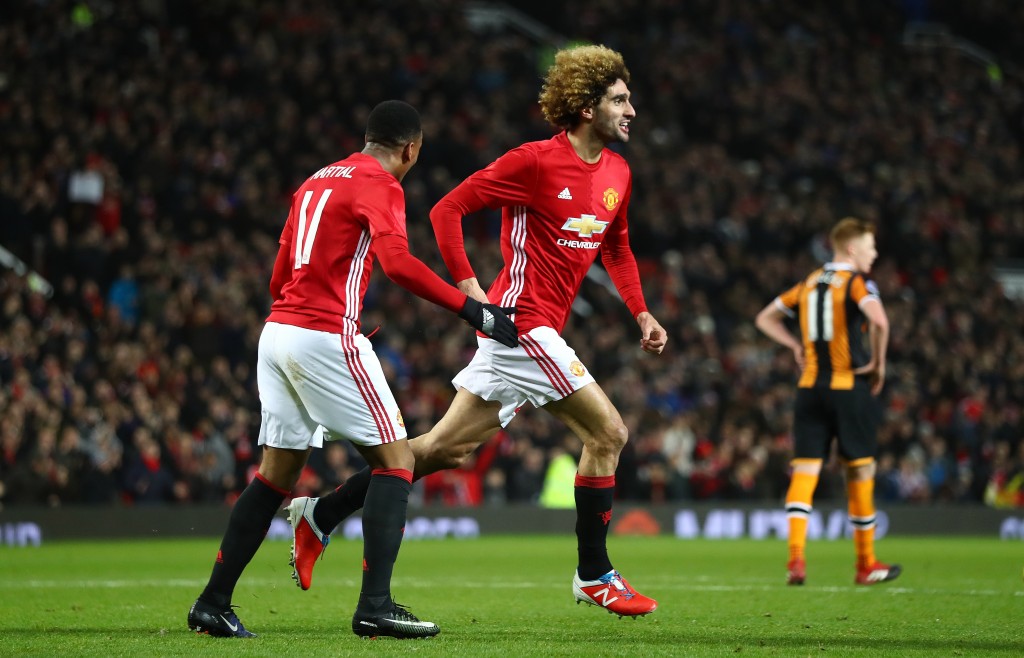 MANCHESTER, ENGLAND - JANUARY 10: Marouane Fellaini of Manchester United celebrates after scoring his sides second goal his sides second goal during the EFL Cup Semi-Final First Leg match between Manchester United and Hull City at Old Trafford on January 10, 2017 in Manchester, England. (Photo by Clive Mason/Getty Images)