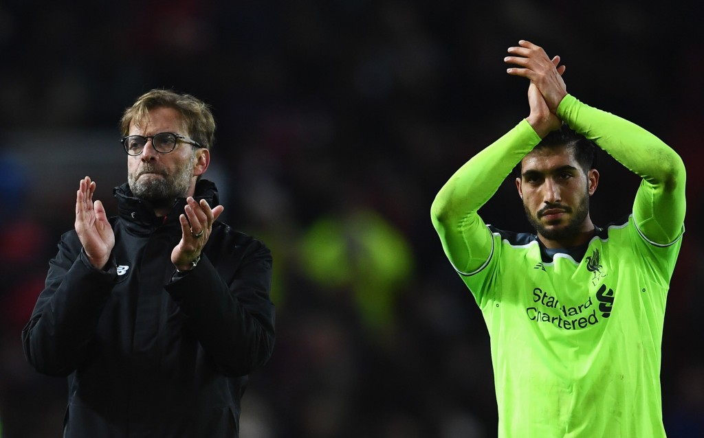 MANCHESTER, ENGLAND - JANUARY 15: Jurgen Klopp manager of Liverpool and Emre Can of Liverpool applaud the travelling fans after the Premier League match between Manchester United and Liverpool at Old Trafford on January 15, 2017 in Manchester, England. (Photo by Laurence Griffiths/Getty Images)