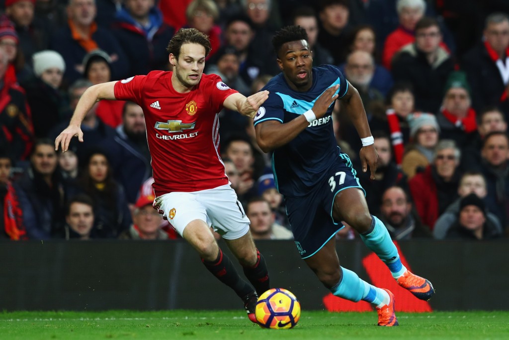 MANCHESTER, ENGLAND - DECEMBER 31: Adama Traore of Middlesbrough gets past the tackle from Daley Blind of Manchester United during the Premier League match between Manchester United and Middlesbrough at Old Trafford on December 31, 2016 in Manchester, England. (Photo by Matthew Lewis/Getty Images)