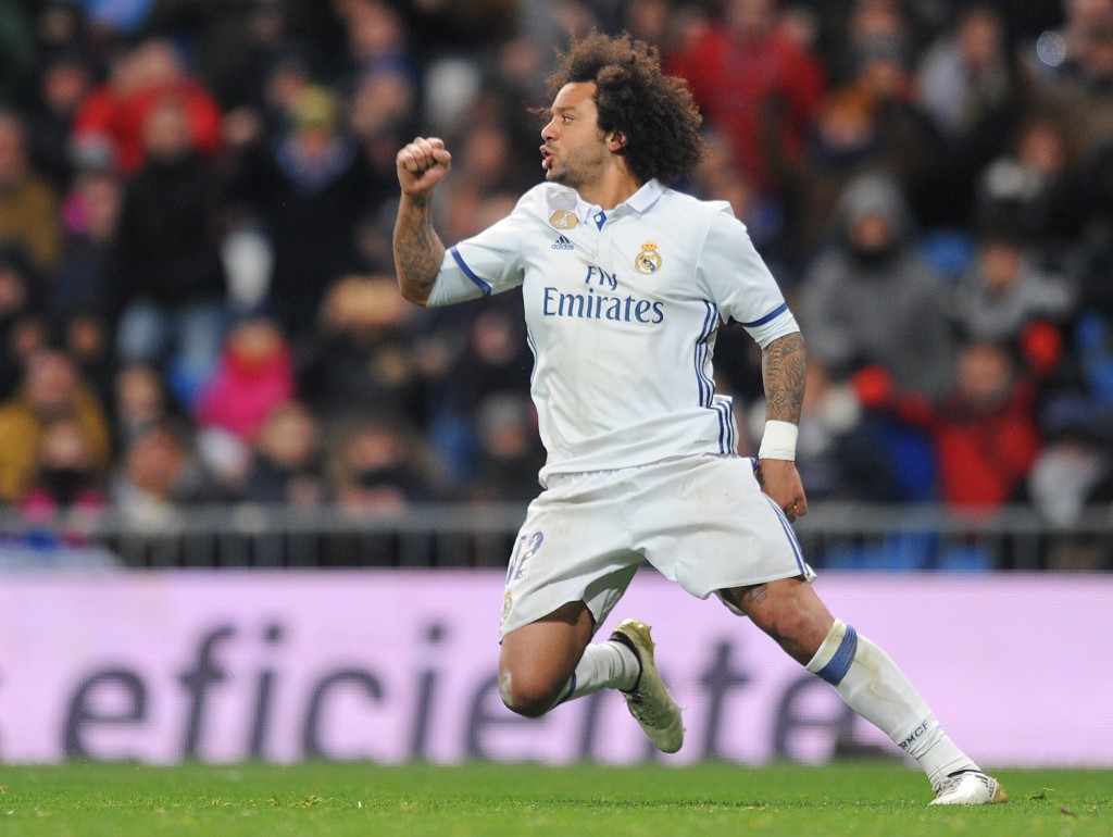 MADRID, SPAIN - JANUARY 18: Marcelo of Real Madrid reacts after scoring his team's first goal during the Copa del Rey Quarter Final, First Leg match between Real Madrid CF and Celta Vigo at Bernabeu on January 18, 2017 in Madrid, Spain. (Photo by Denis Doyle/Getty Images)