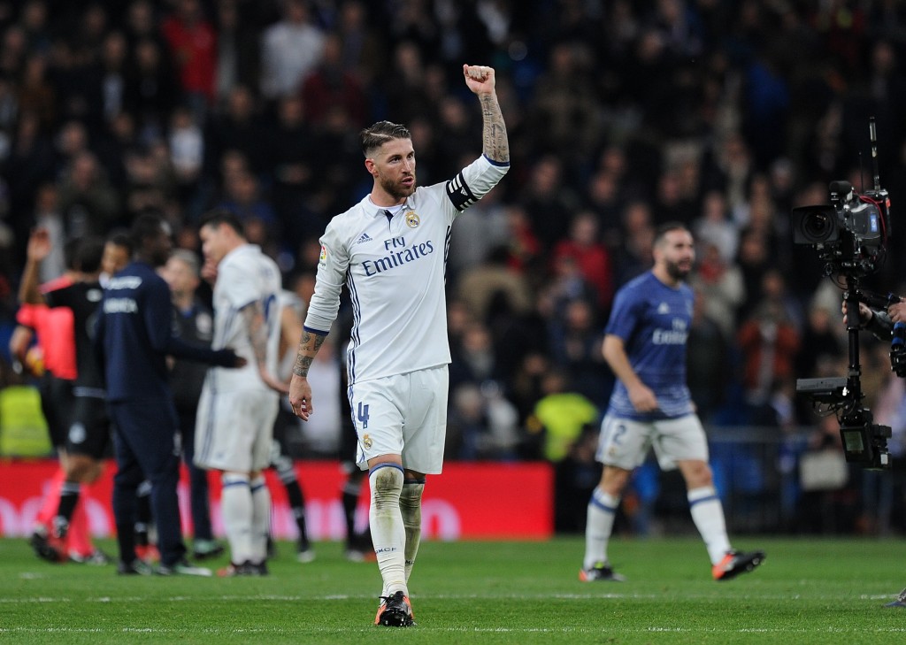 MADRID, SPAIN - DECEMBER 10: Sergio Ramos of Real Madrid celebrates after Real beat RC Deportivo La Coruna 3-2 in the La Liga match between Real Madrid CF and RC Deportivo La Coruna at Estadio Santiago Bernabeu on December 10, 2016 in Madrid, Spain. (Photo by Denis Doyle/Getty Images)
