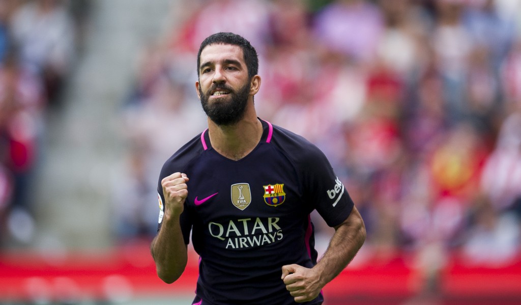 GIJON, SPAIN - SEPTEMBER 24: Arda Turan of FC Barcelona celebrates after scoring his team's fourth goal during the La Liga match between Real Sporting de Gijon and FC Barcelona at Estadio El Molinon on September 24, 2016 in Gijon, Spain. (Photo by Juan Manuel Serrano Arce/Getty Images)