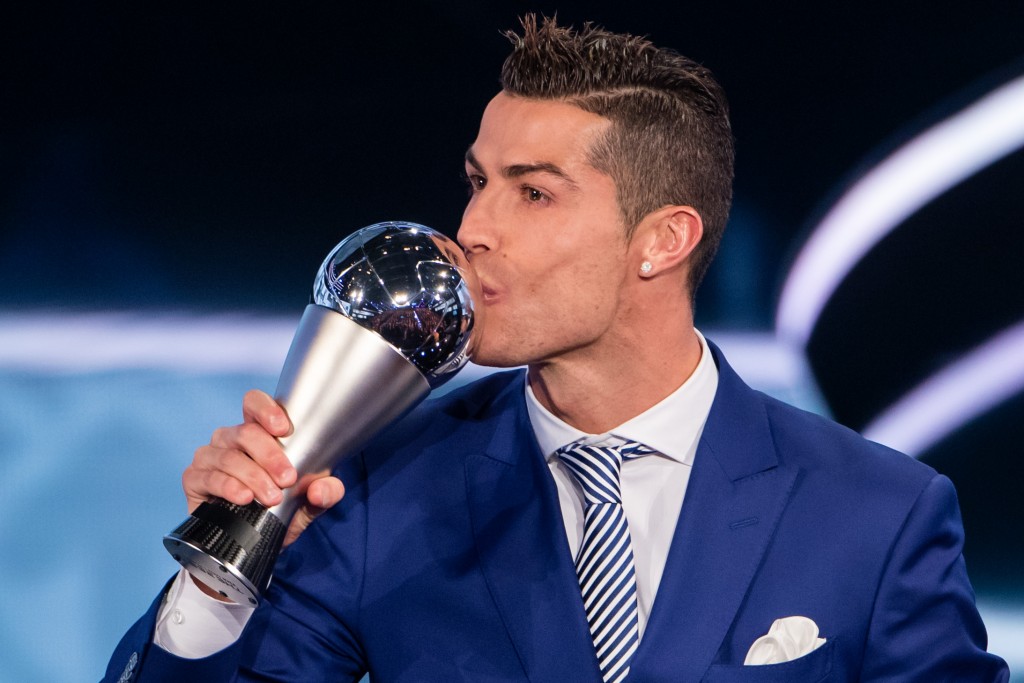 ZURICH, SWITZERLAND - JANUARY 09: The Best FIFA Men's Player Award winner Cristiano Ronaldo of Portugal and Real Madrid kisses the trophy during The Best FIFA Football Awards 2016 on January 9, 2017 in Zurich, Switzerland. (Photo by Philipp Schmidli/Getty Images)