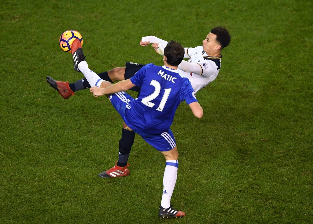 LONDON, ENGLAND - JANUARY 04: Nemanja Matic of Chelsea (L) and Dele Alli of Tottenham Hotspur (R) battle for possession during the Premier League match between Tottenham Hotspur and Chelsea at White Hart Lane on January 4, 2017 in London, England. (Photo by Mike Hewitt/Getty Images)